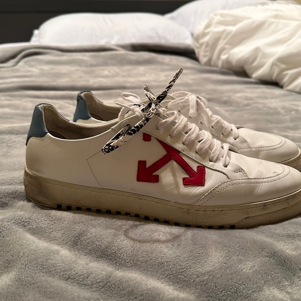 White Off white shoes with red arrow